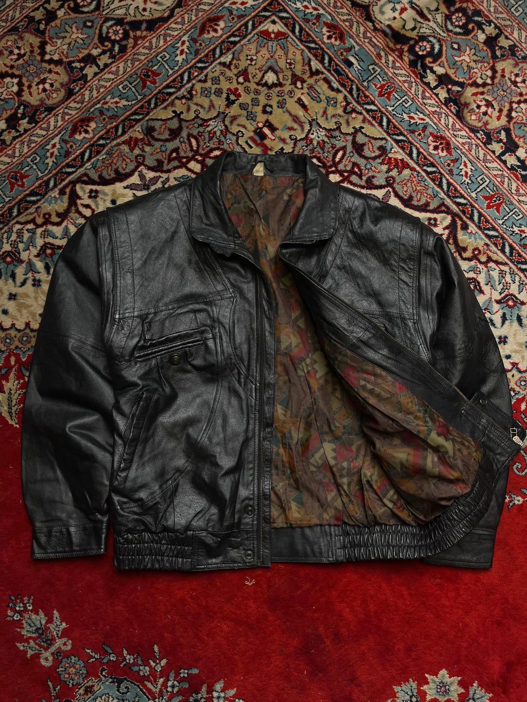 Vintage Black Genuine Leather Bomber Jacket with Patterned Lining