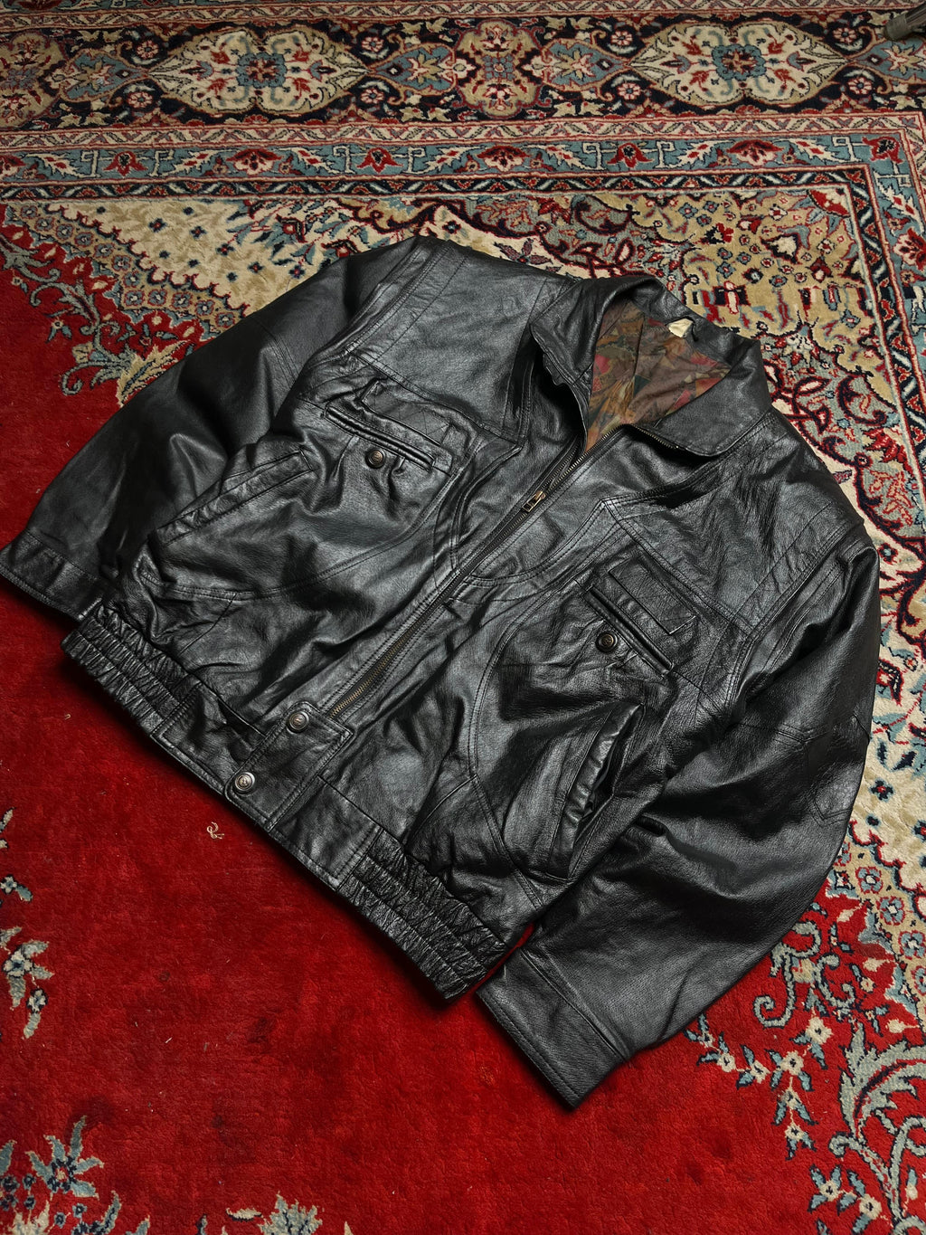 Vintage Black Genuine Leather Bomber Jacket with Patterned Lining