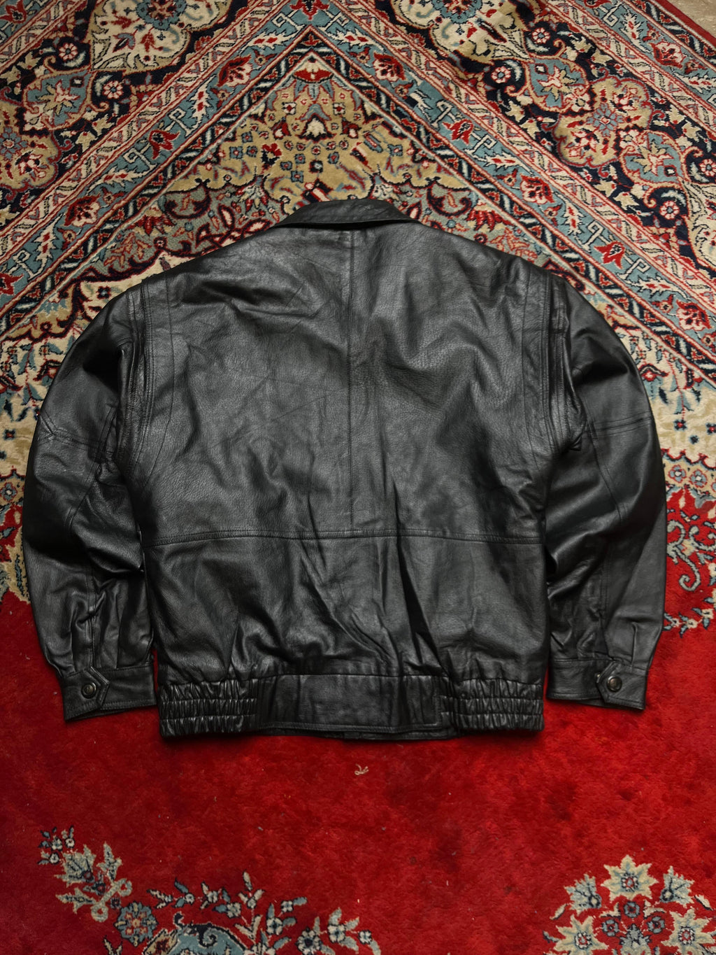 Vintage Black Genuine Leather Bomber Jacket with Patterned Lining