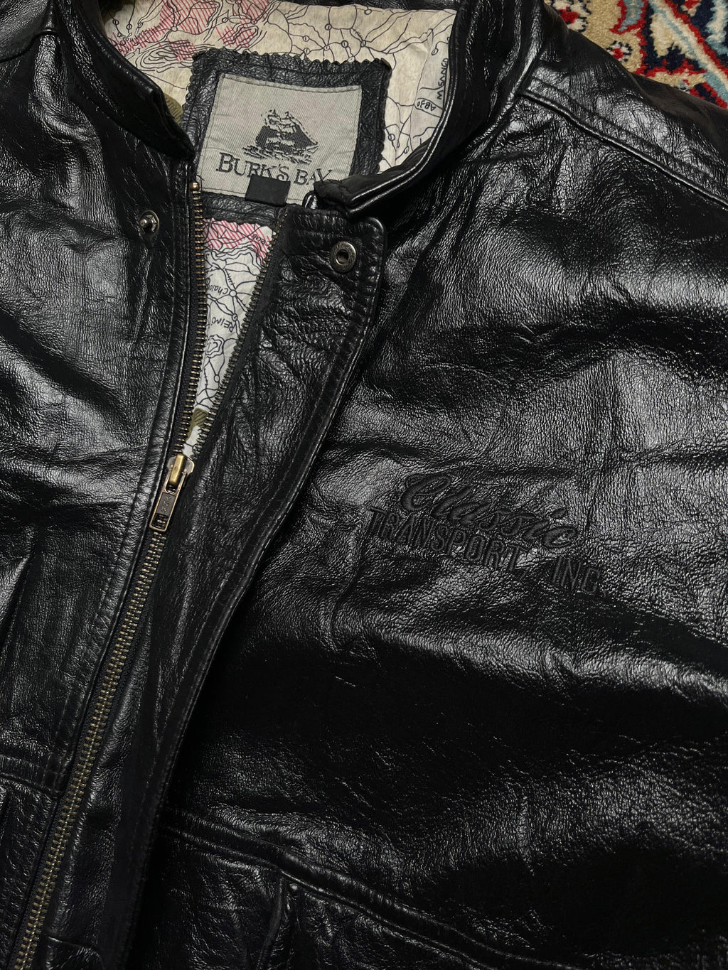 Burk’s Bay Black Leather Bomber Jacket with Map-Print Lining