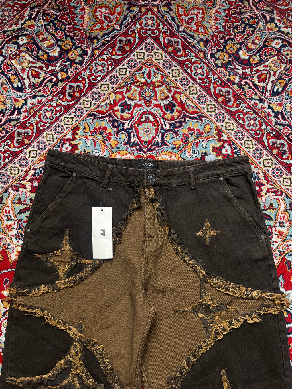 boohooMAN Wide FIT Distressed Star Patch Brown Raw Hem JEANS - 38