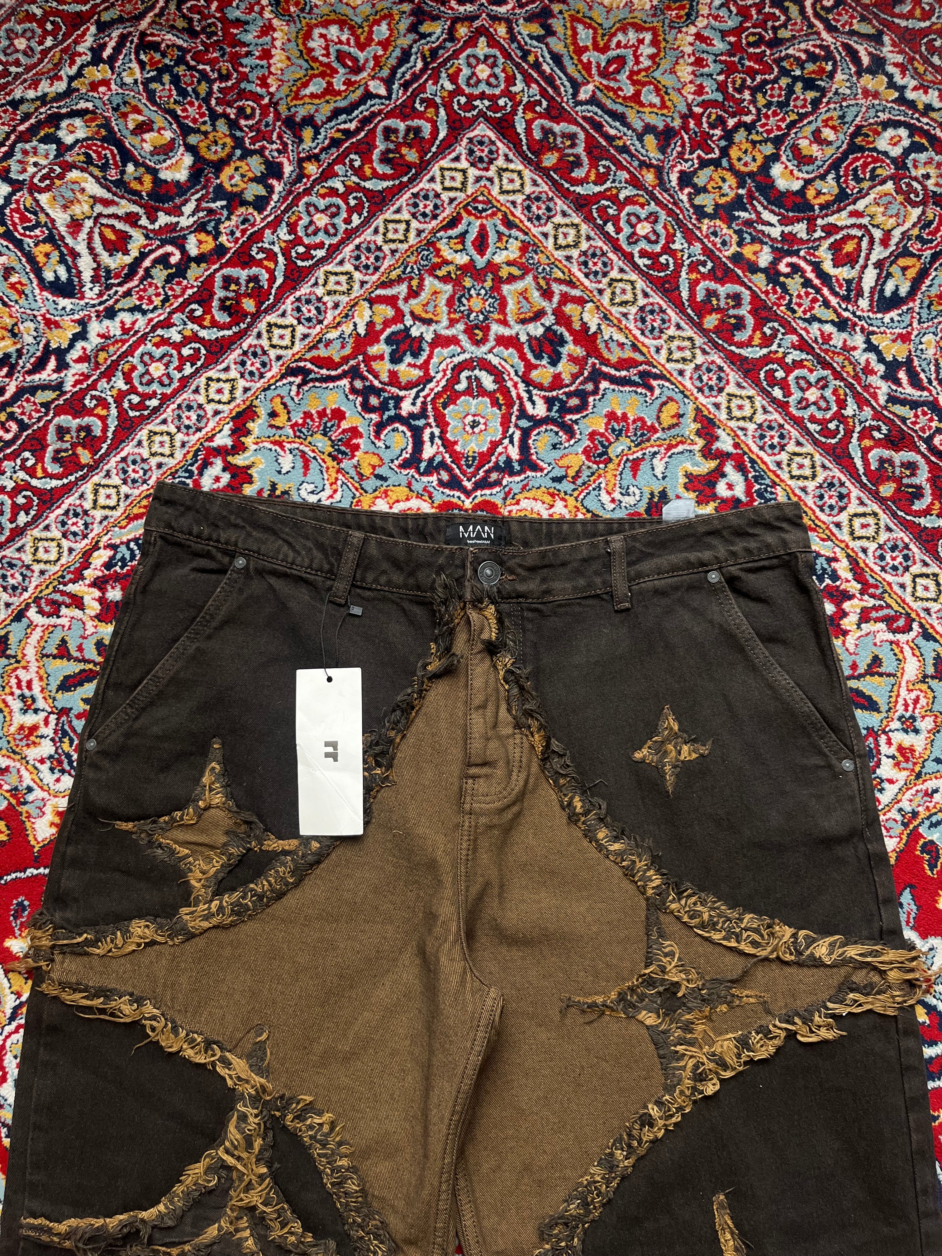 boohooMAN Wide FIT Distressed Star Patch Brown Raw Hem JEANS - 38