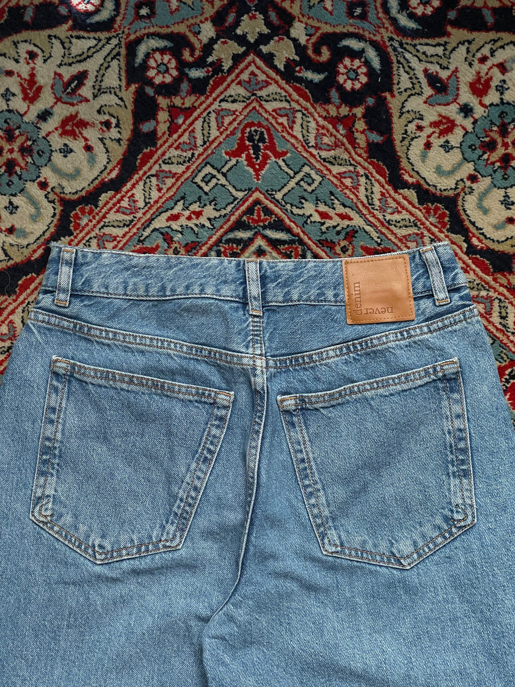 NEVER DENIM LIGHT WASH HIGH WAIST JEANS