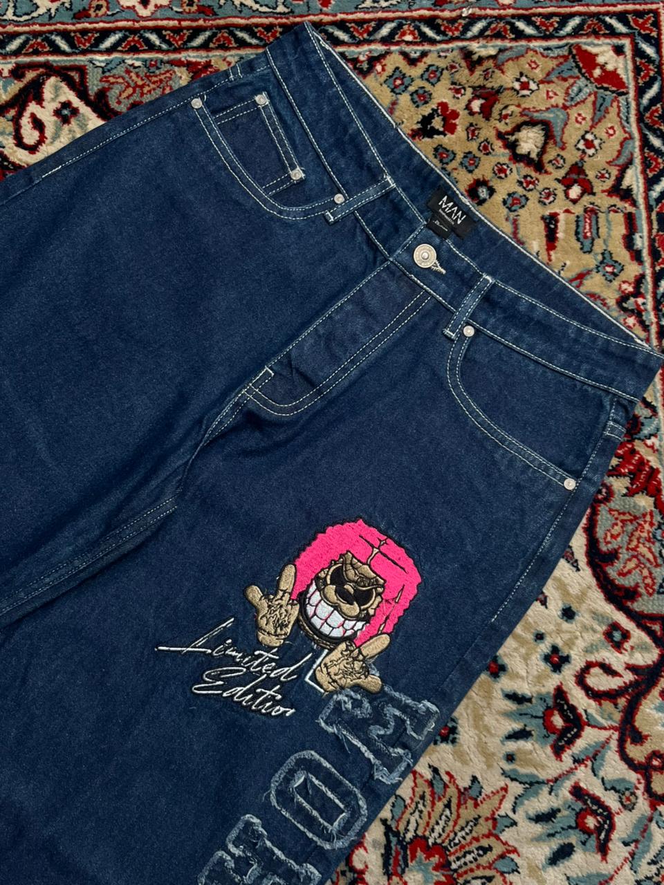 boohooMAN Embroidered Cartoon Baggy Pants
