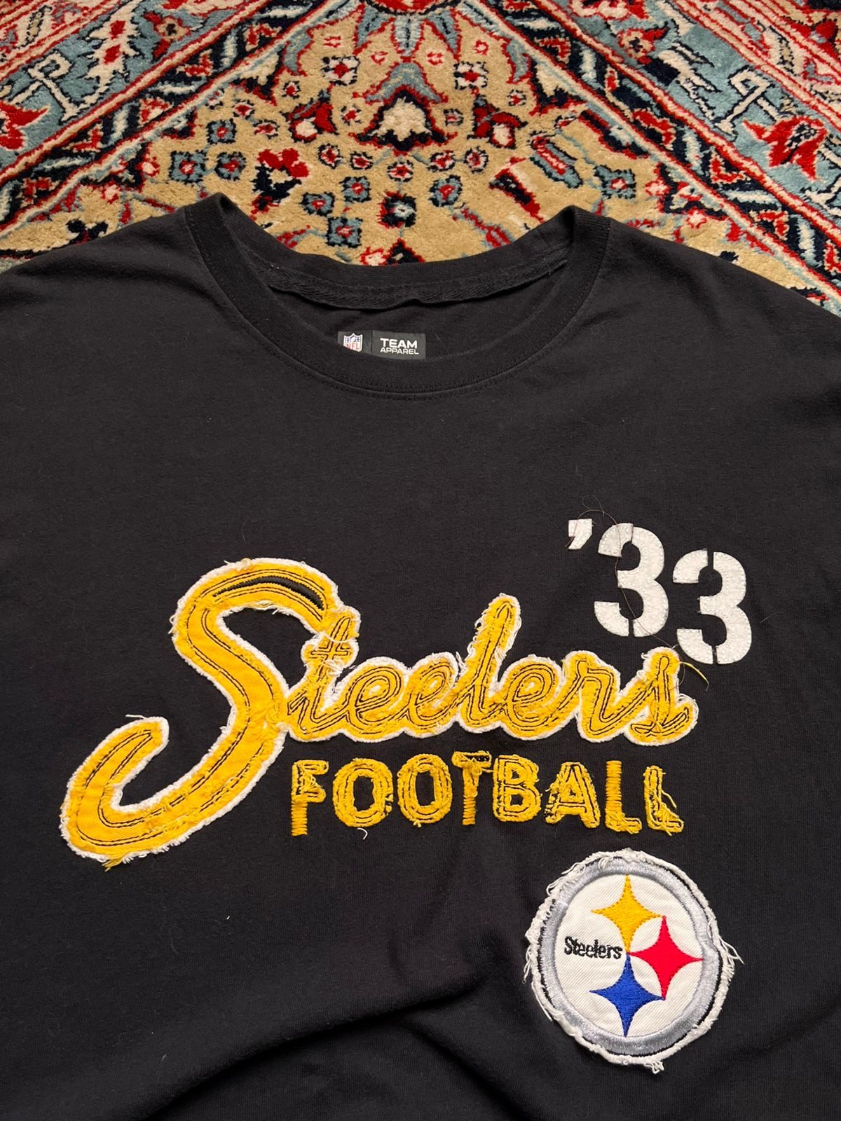 NFL Team Apparel Pittsburgh Steelers Black Football Graphic TEE