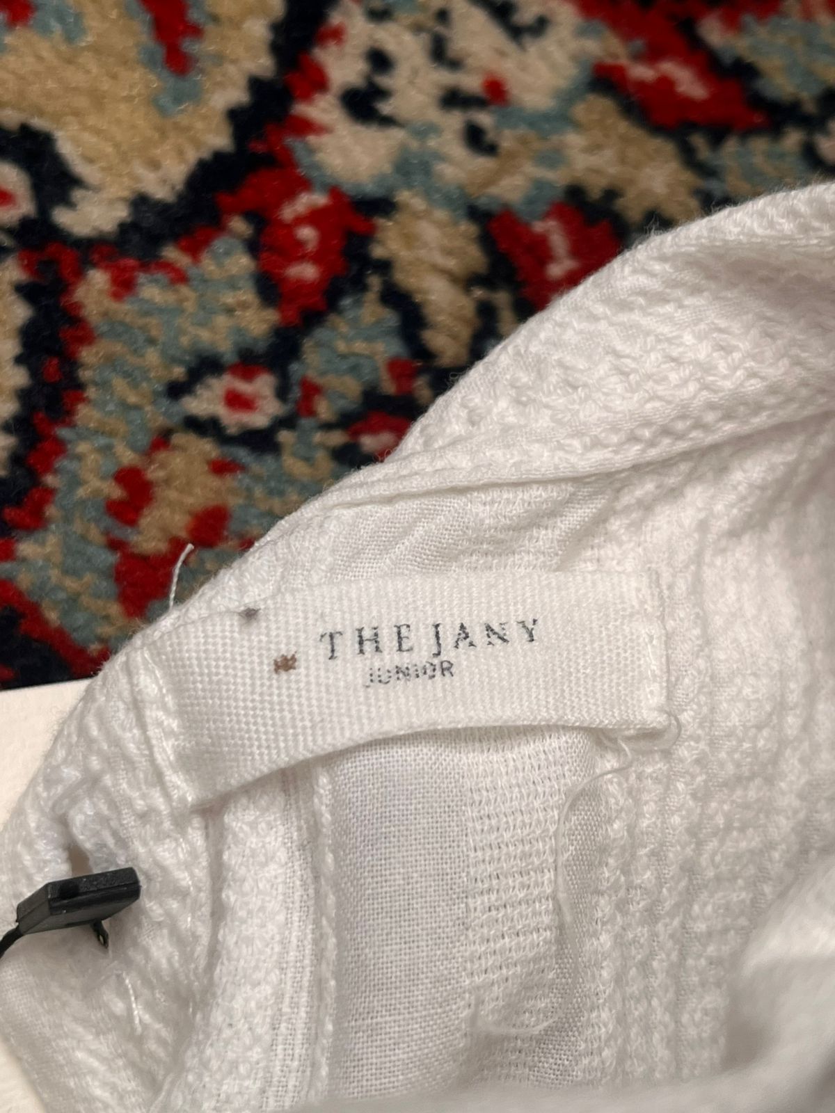 The Jany Junior White Textured Button Down Blouse