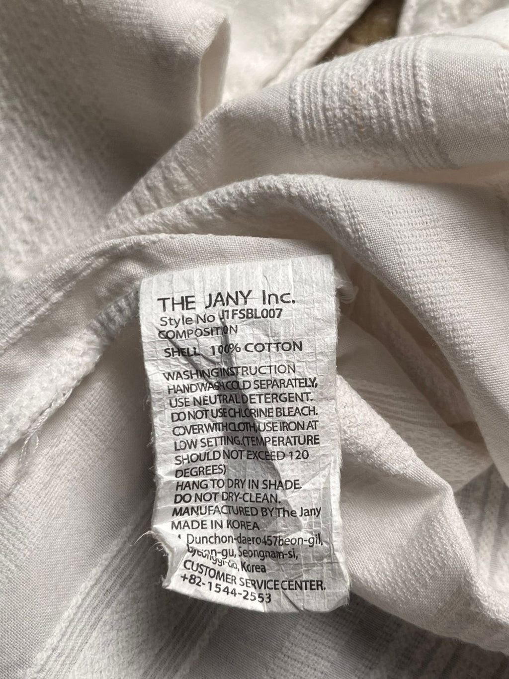 The Jany Junior White Textured Button Down Blouse