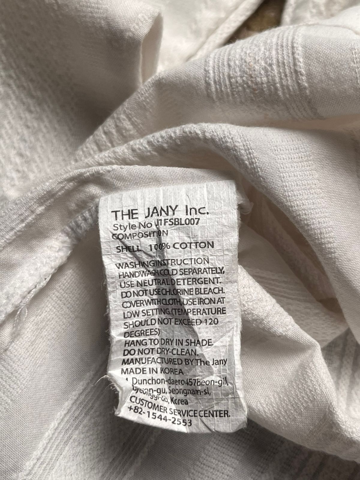 The Jany Junior White Textured Button Down Blouse