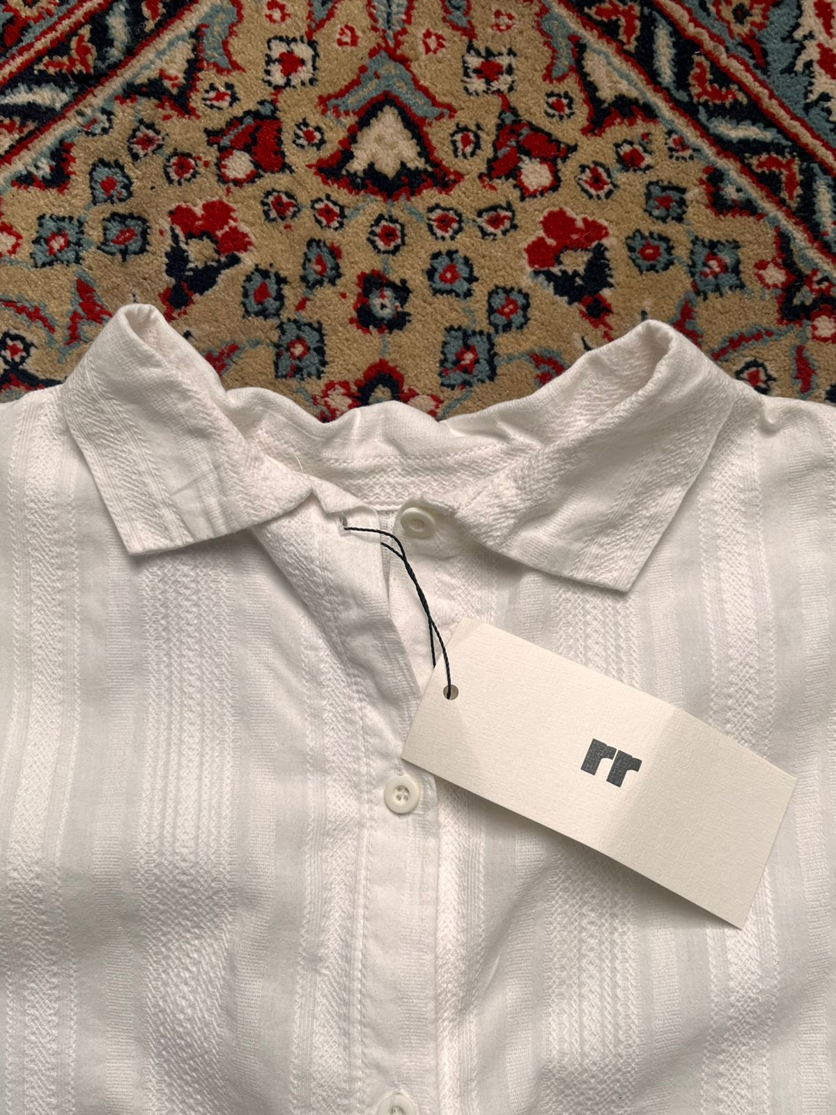 The Jany Junior White Textured Button Down Blouse