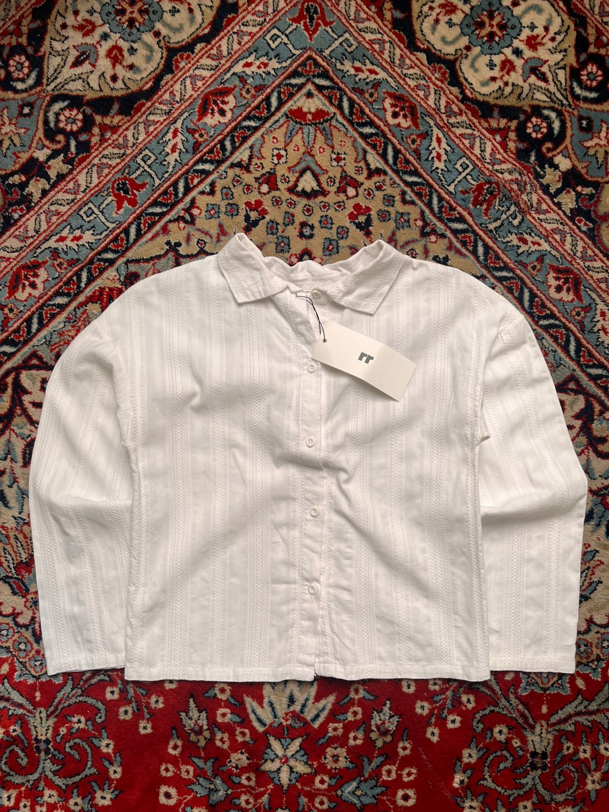 The Jany Junior White Textured Button Down Blouse