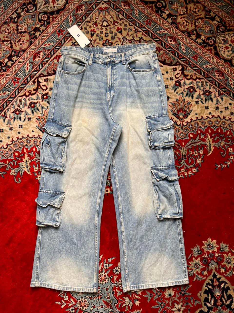 BERSHKA BAGGY LIGHT WASH MULTI POCKET DENIM CARGO PANTS - 34