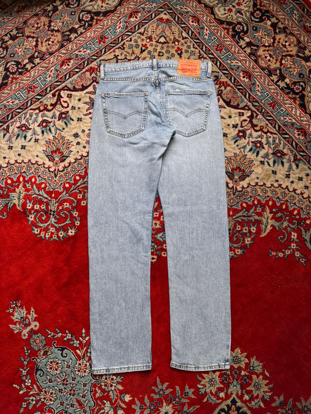 LEVI'S 502 REGULAR TAPER WATERLESS LIGHT WASH JEANS - 30
