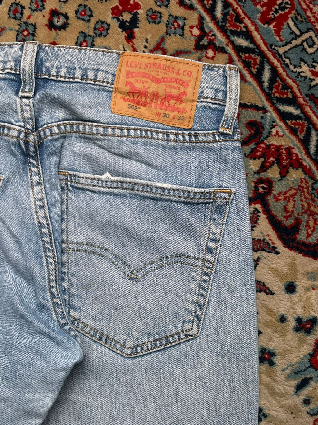 LEVI'S 502 REGULAR TAPER WATERLESS LIGHT WASH JEANS - 30