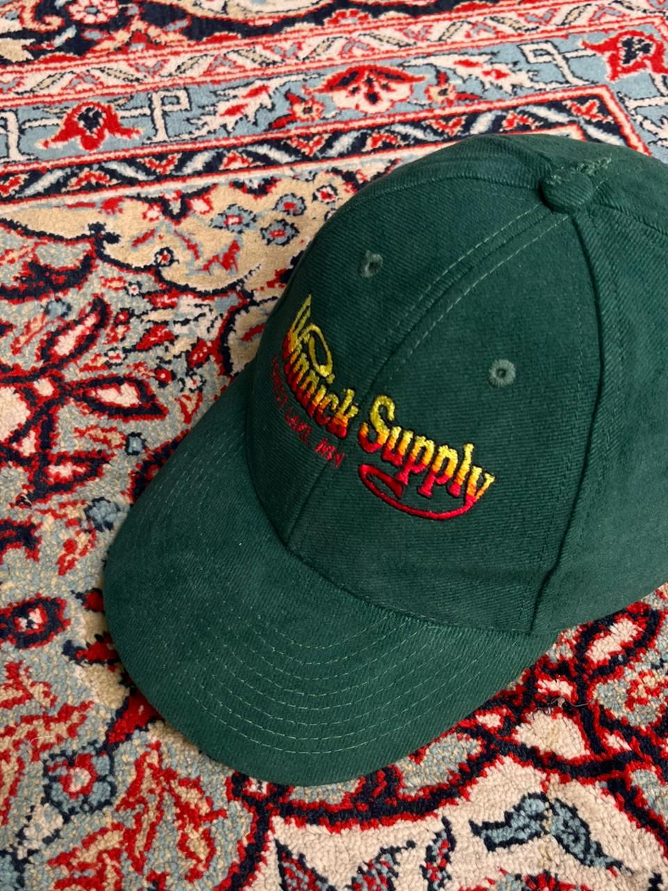 WINNICK SUPPLY FOREST LAKE MN EMBROIDERED DARK GREEN CAP