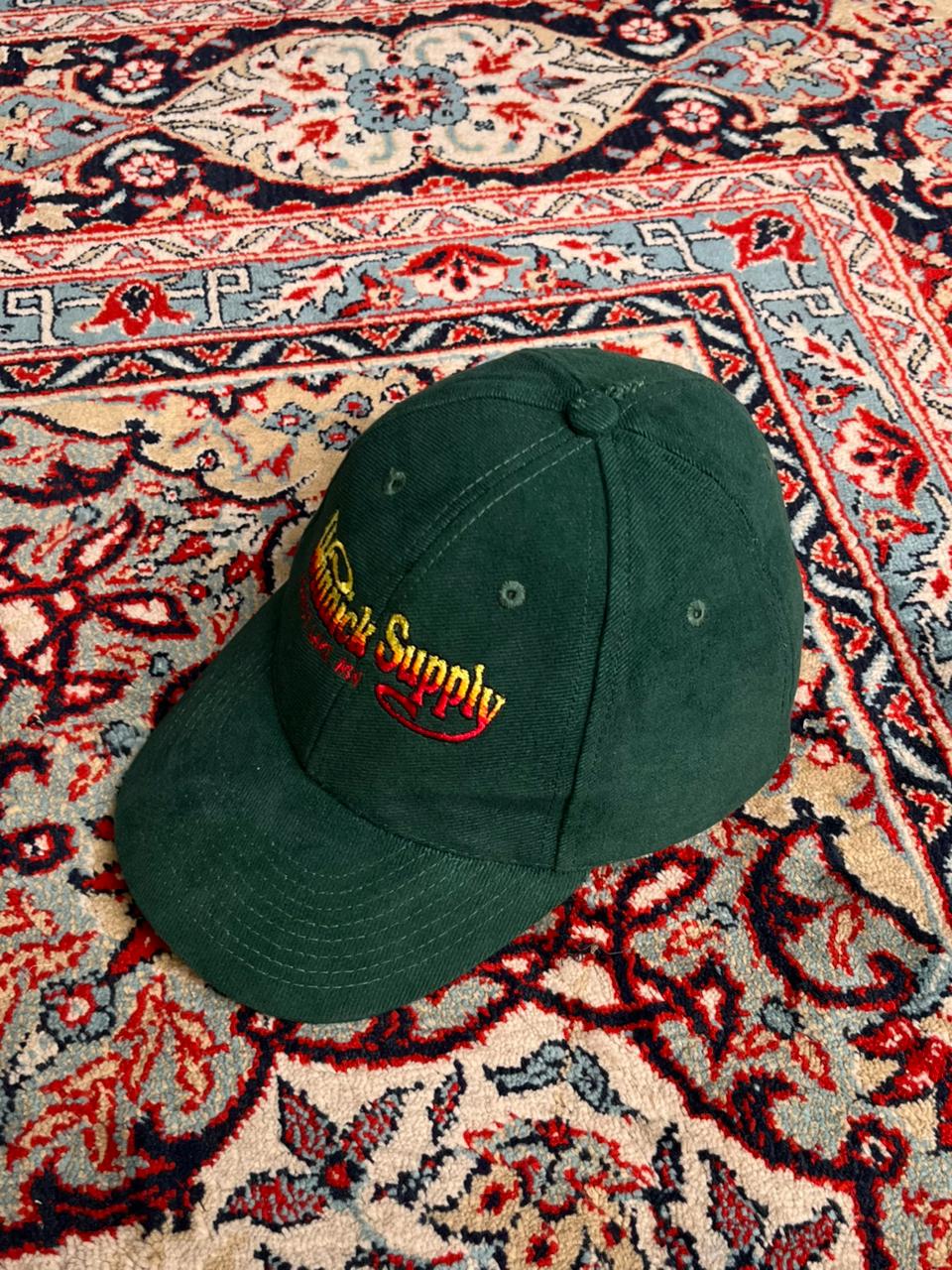 WINNICK SUPPLY FOREST LAKE MN EMBROIDERED DARK GREEN CAP