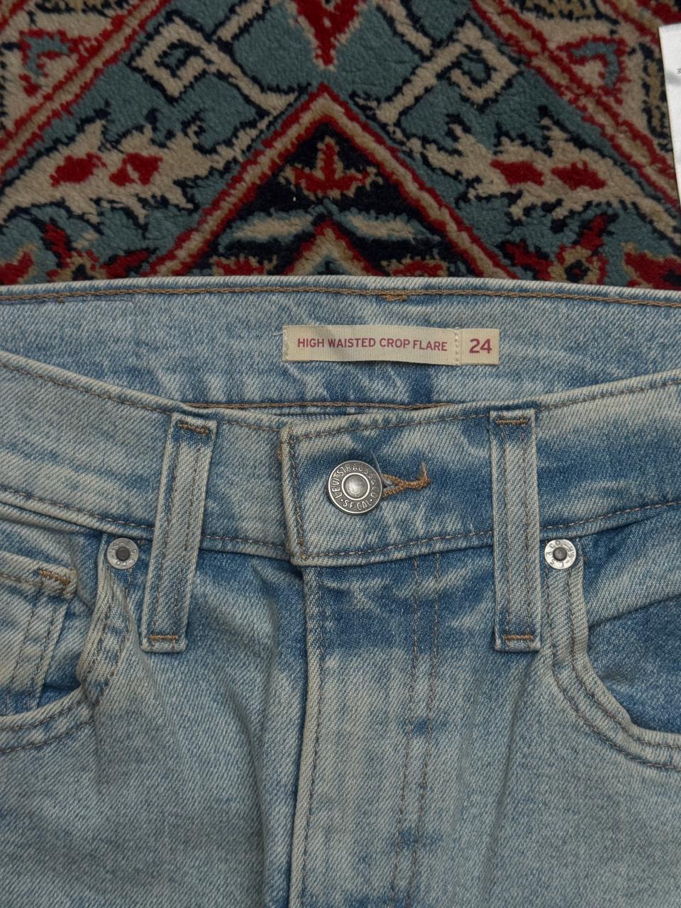 LEVI'S  LIGHT WASH HIGH WAISTED CROP FLARED JEANS - 24