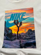 THE NIKE WHITE GRAPHIC TEE - XL