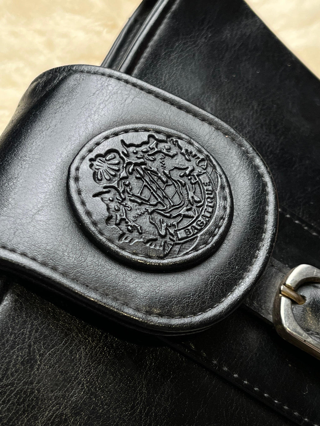 Vintage 90s Bagatique Black Structured Bucket Crossbody Bag Crest Buckle Flap